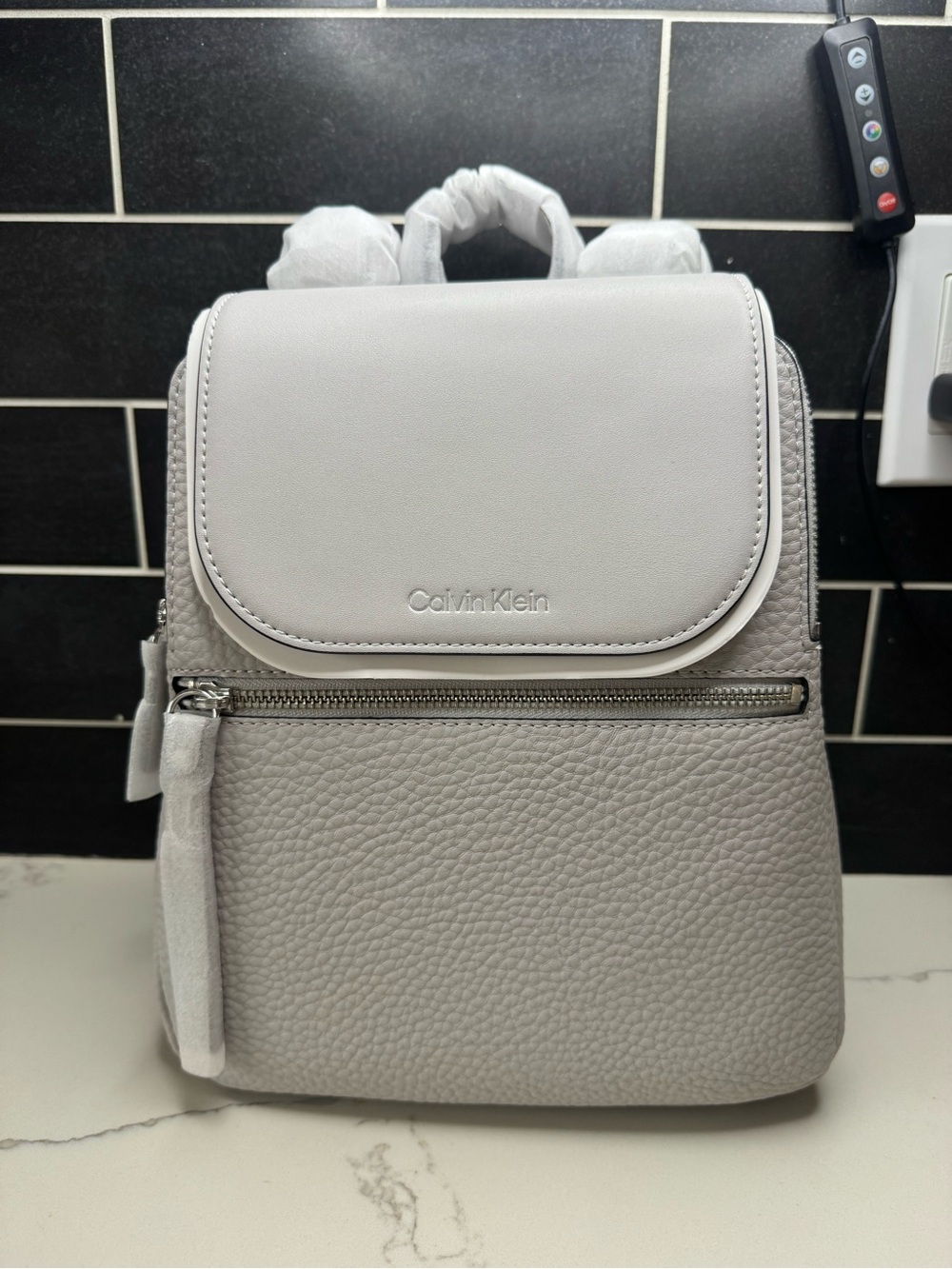 Calvin Klein Light Gray Pebbled Leather Mini Backpack